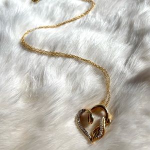 1/8 CT. T.W. Diamond Infinity Swirl Heart Pendant Sterling Silver 14K Gold Plate